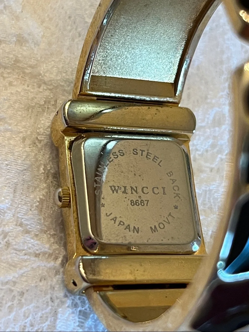Wincci Gold Tone Cuff Watch with Black Inlay